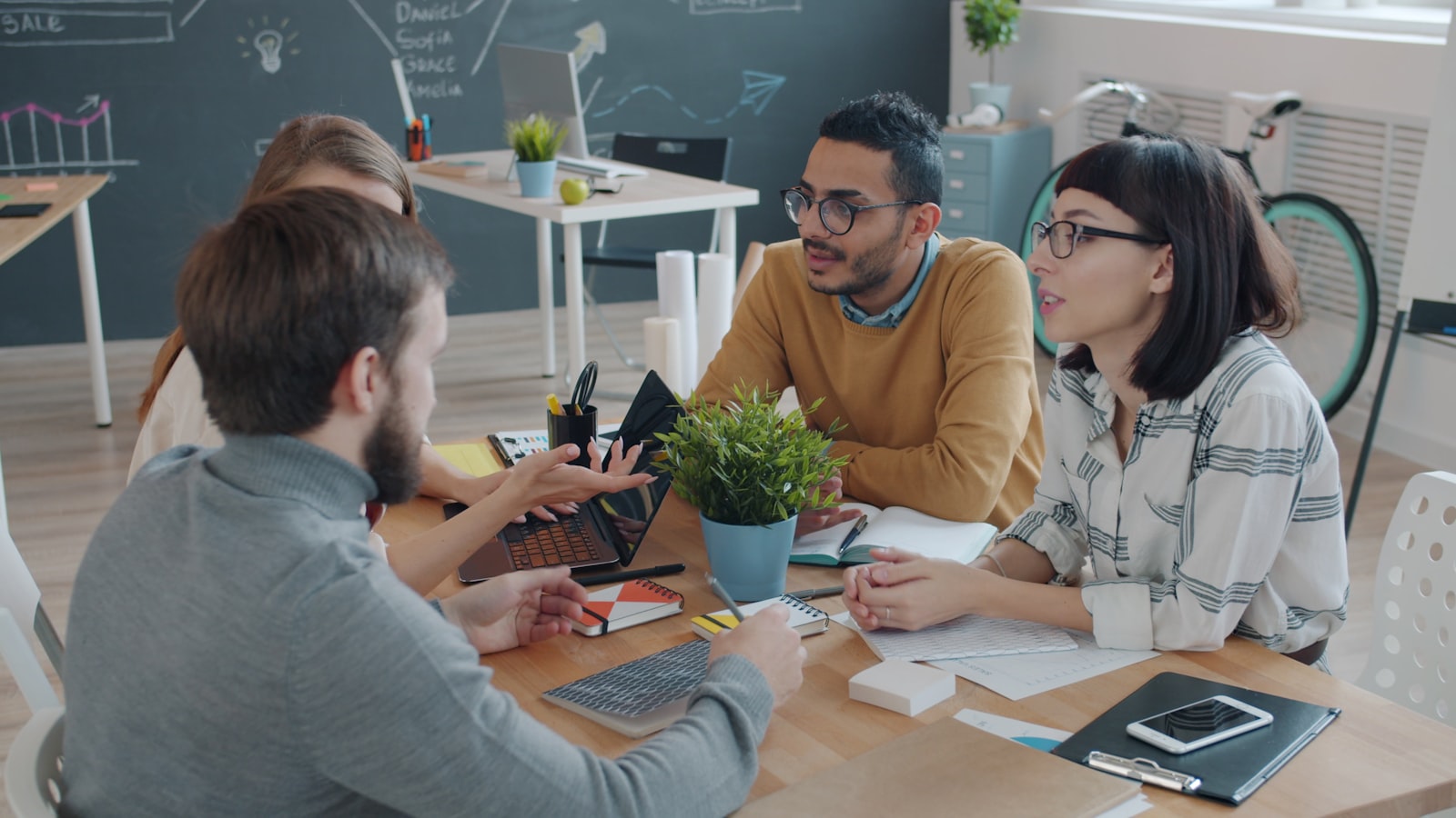 The team reviewing a project together